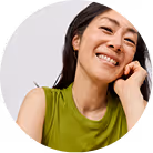 Alessia Tan, Zoey nutritionist, smiling warmly in circular portrait